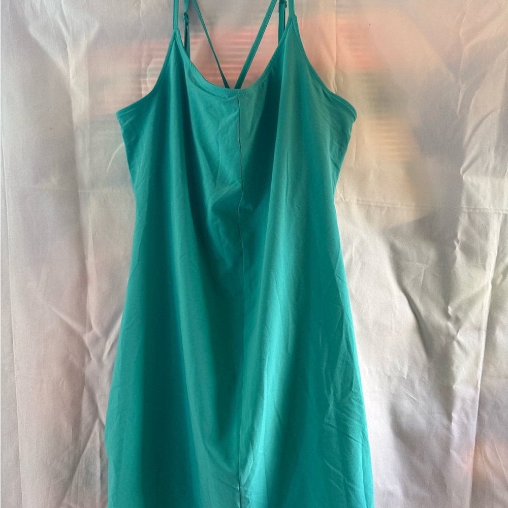 Columbia turquoise dress with built in bra and shorts with pocket